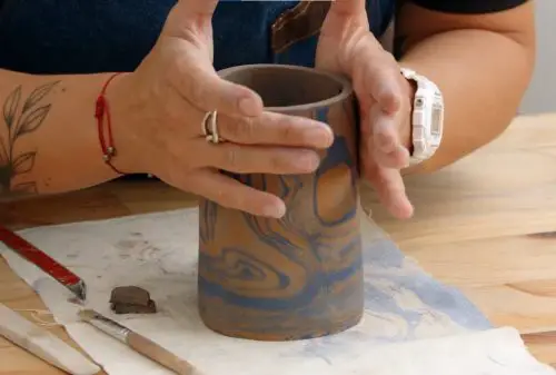 Pitcher with marbled clay